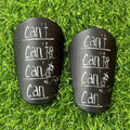 Mini shin pads with famous can-can`t motif